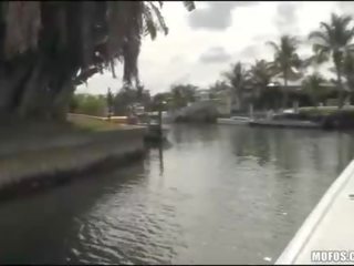 Dude videos his sunbathing GF off a boat