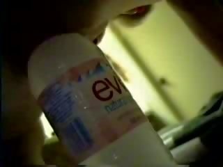 A bottle of purified water brings her to orgasm mov
